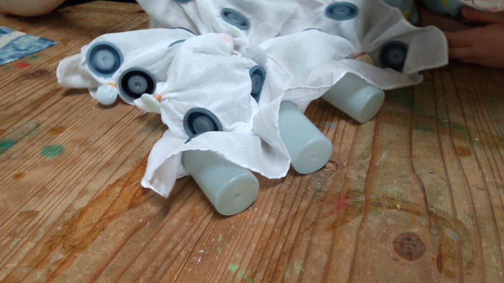 Cloth sandwiched between film cases